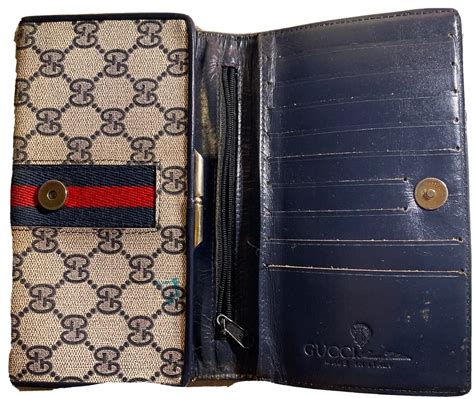 vintage gucci long wallet|old gucci wallet styles.